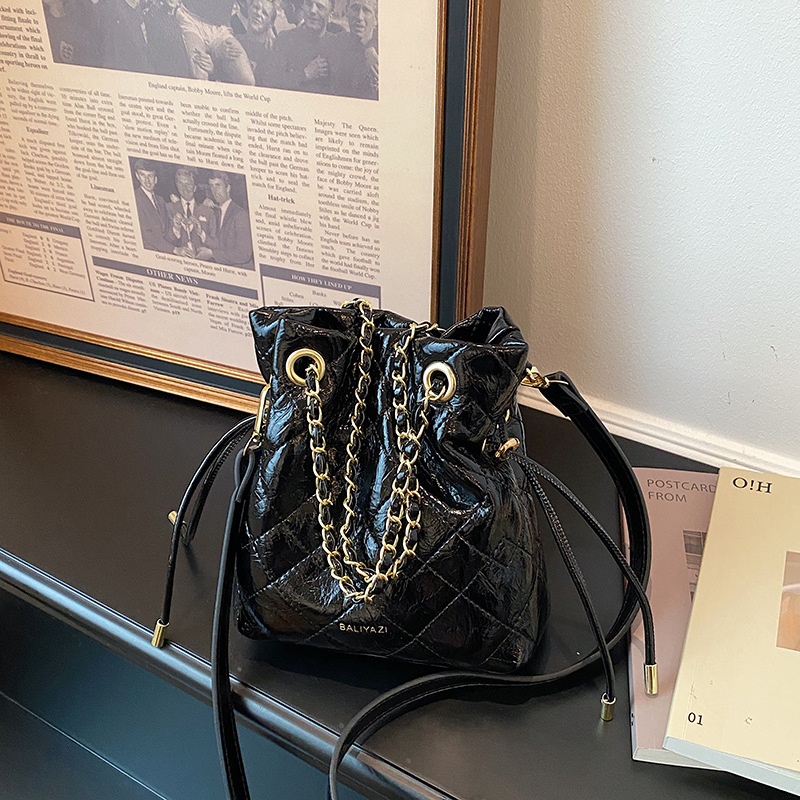 Gestikte trekkoordtas voor dam - Chain Crossbody Quilted recensie en prijs
