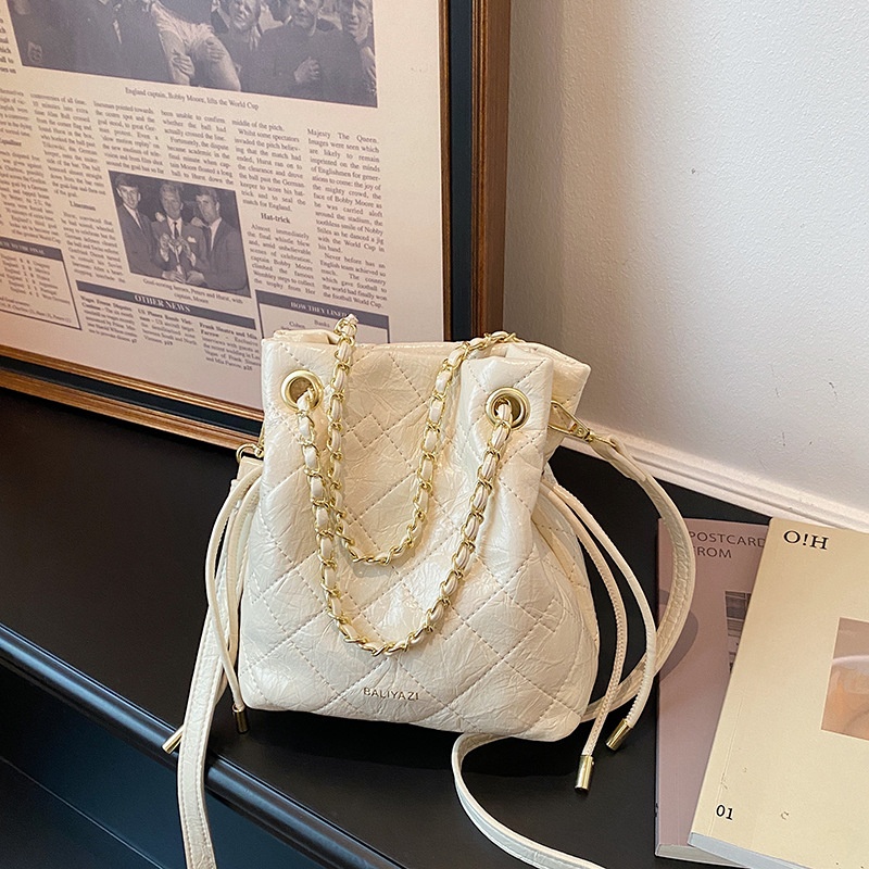 Gestikte trekkoordtas voor dam - Chain Crossbody Quilted recensie en prijs