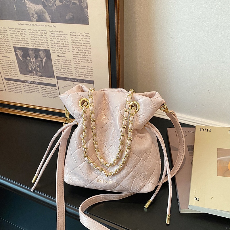 Gestikte trekkoordtas voor dam - Chain Crossbody Quilted recensie en prijs